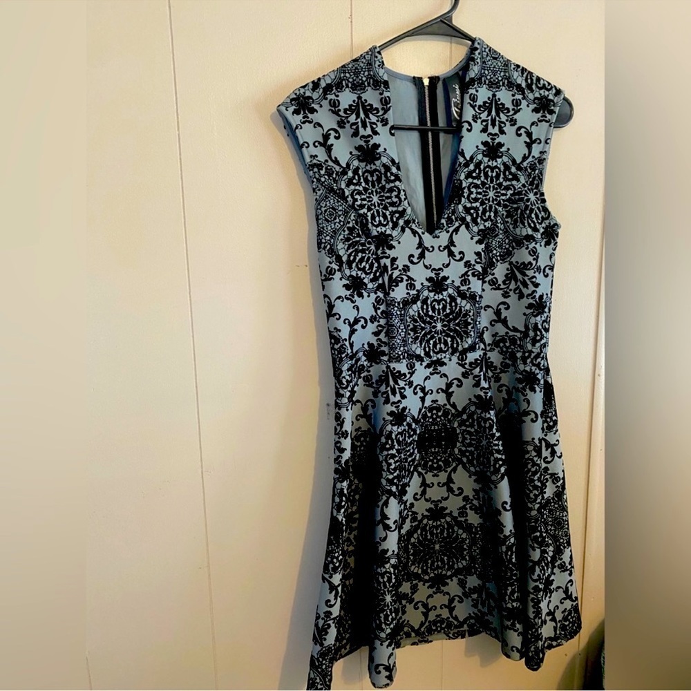 Trixxi Elegant holiday dress, velvety soft peplum, a line skater dress - Picture 1 of 8